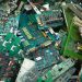 Prikaz elektronskog otpada (e-otpada) koji uključuje stare uređaje poput mobilnih telefona, računara i televizora, simbolizujući izazove i mogućnosti reciklaže u okviru cirkularne ekonomije.